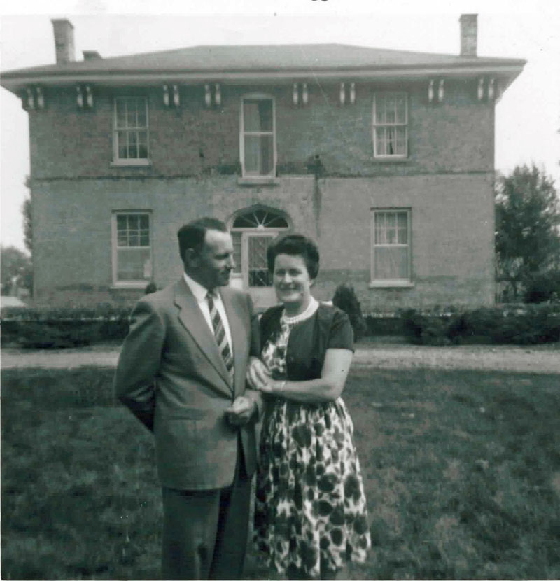 1961 Bill & Joan in front of their home